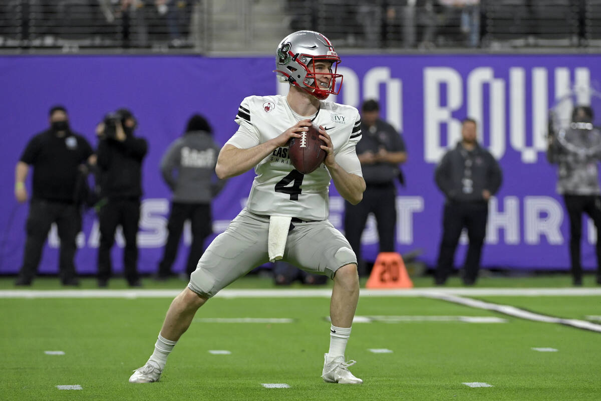 East quarterback EJ Perry (4), of Brown, looks for a receiver during the second half of the Eas ...