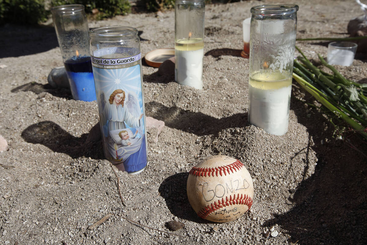 A makeshift memorial for Jeffrey Michael Gonzales is seen at the intersection of Windmill Lane ...