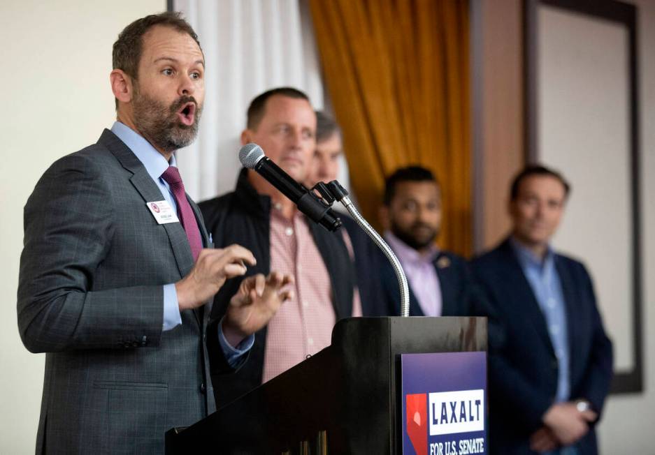 Jesse Law, chairman of the Clark County Republican Party, introduces speakers during a campaign ...