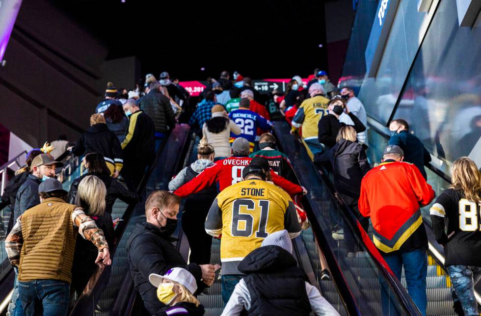 Fans make their way to their seats before the start of the NHL All-Star skills competition on F ...