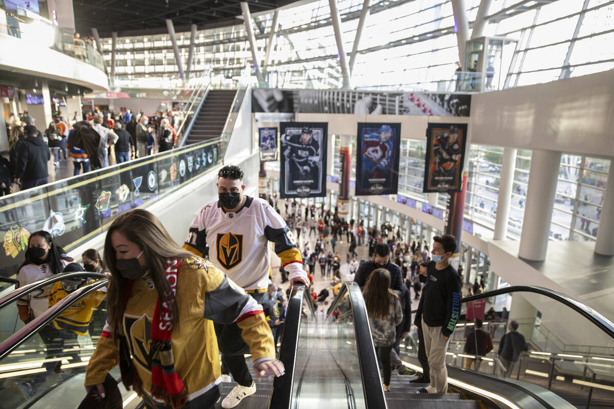 Fans make their way to their seats before the start of the NHL All-Star skills competition on F ...
