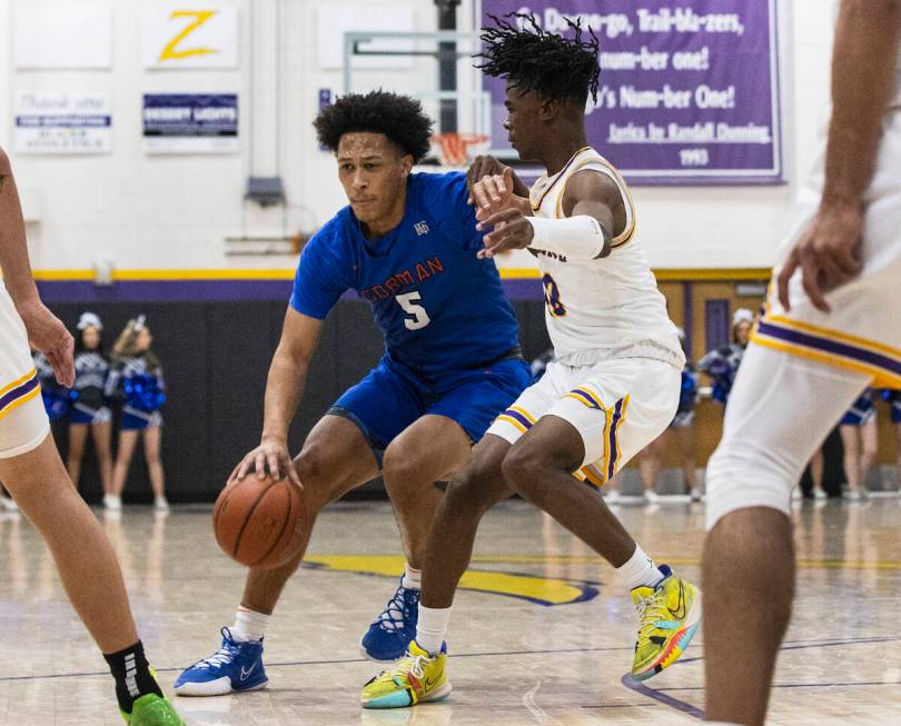 Bishop Gorman’s Darrion Williams (5) drives against Durango High’s Tylen Riley (1 ...