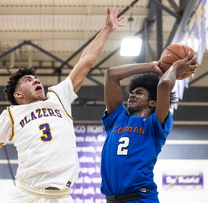 Durango High’s Shane Thomas (3) defends as Bishop Gorman’s Keenan Bey (2) goes fo ...