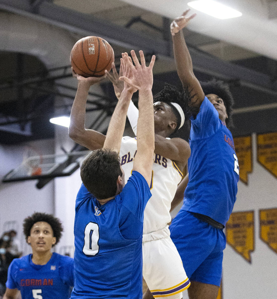 Durango high’s Tylen Riley (10) sandwiched between Bishop Gorman’s Ryan Abelman ( ...