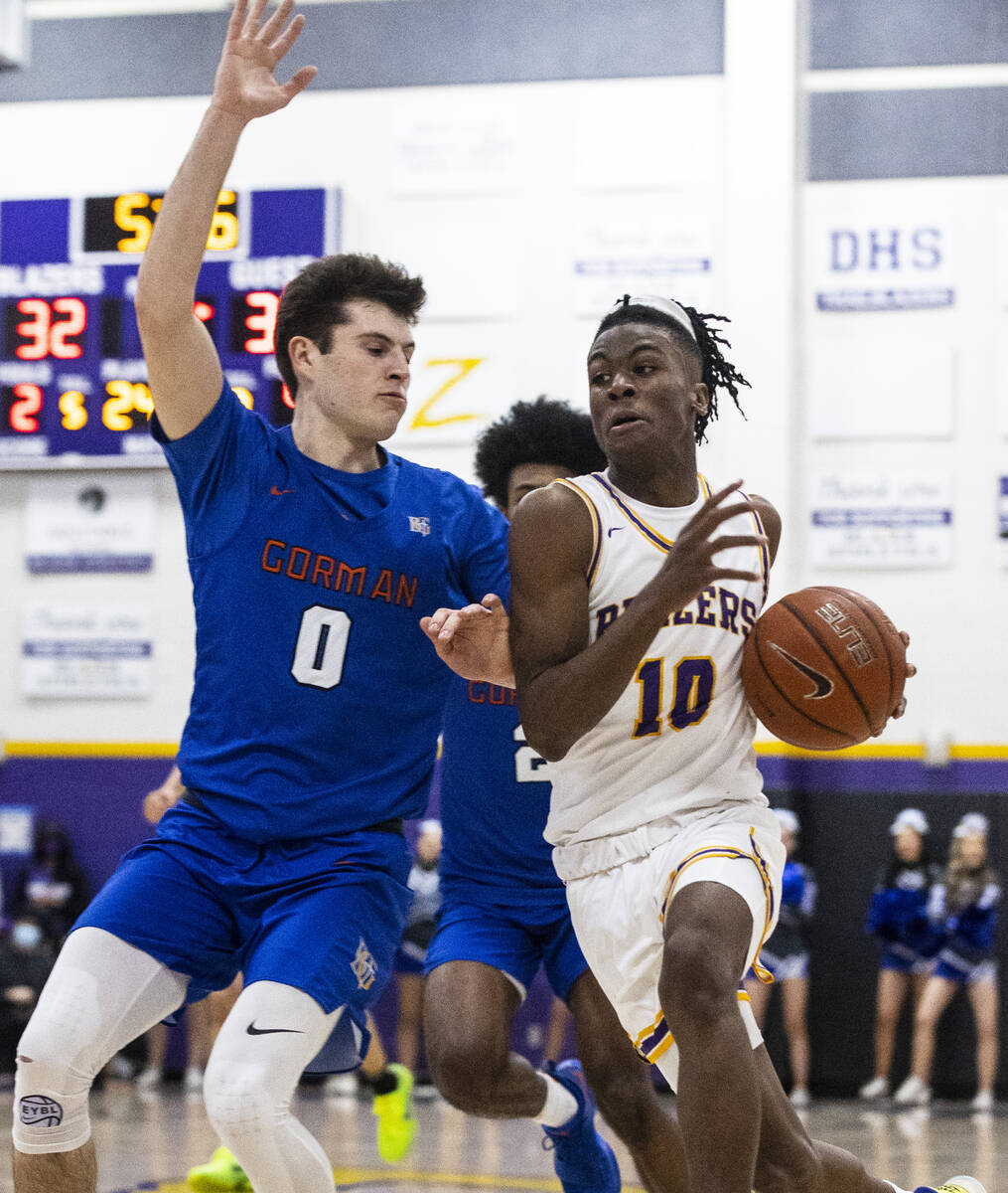 Durango High’s Tylen Riley (10) drives past Bishop Gorman’s Ryan Abelman (0) duri ...