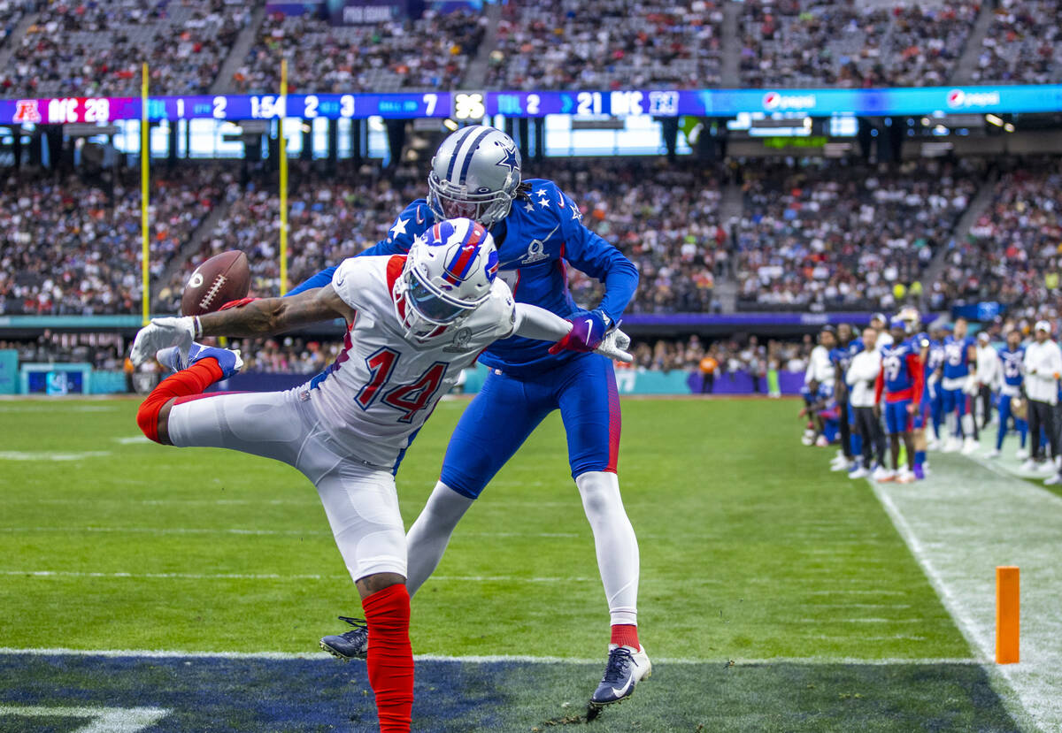 AFC wide receiver Stefon Diggs of the Buffalo Bills (14) has a pass broken up in the end zone b ...