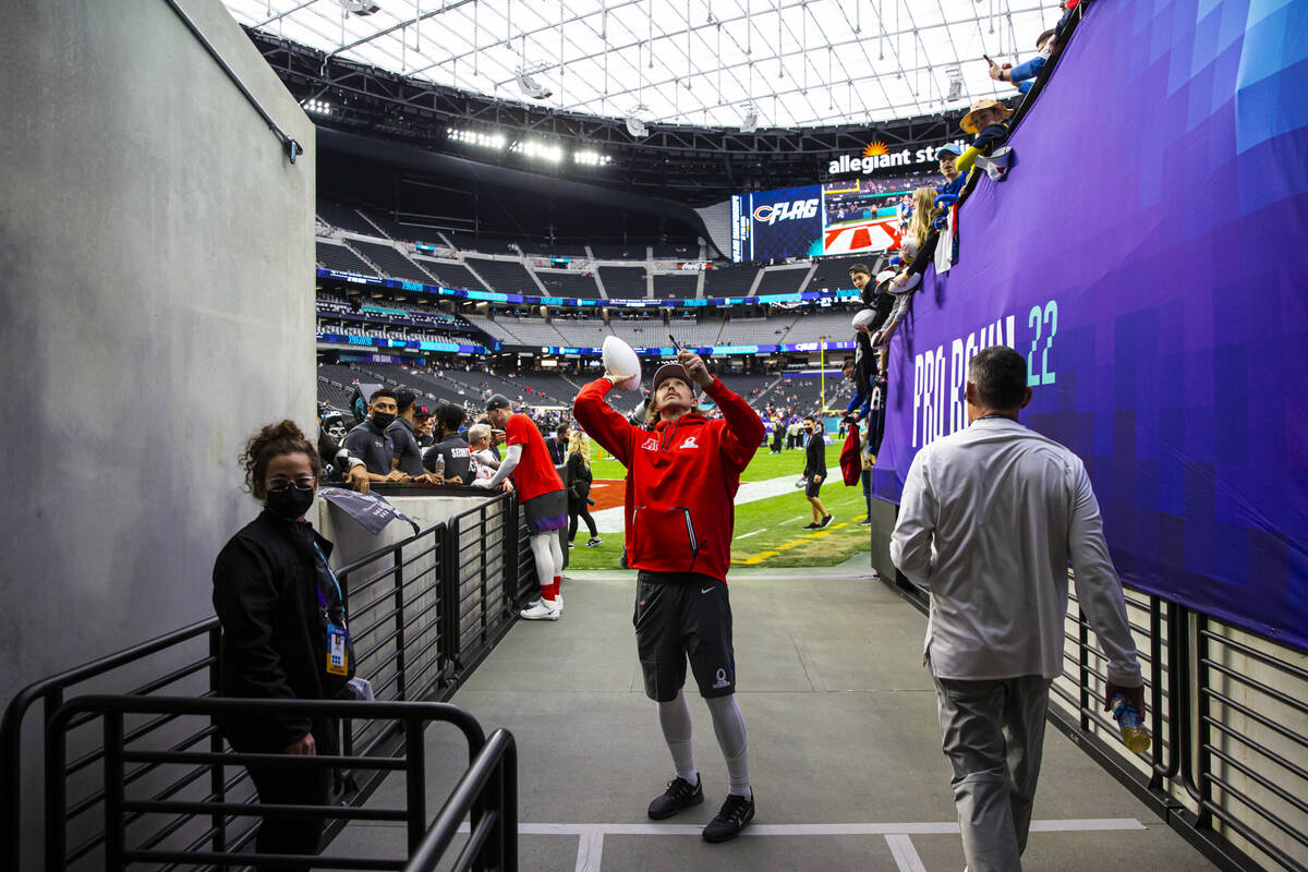 AFC punter AJ Cole of the Las Vegas Raiders passes a ball before the start of an NFL Pro Bowl f ...