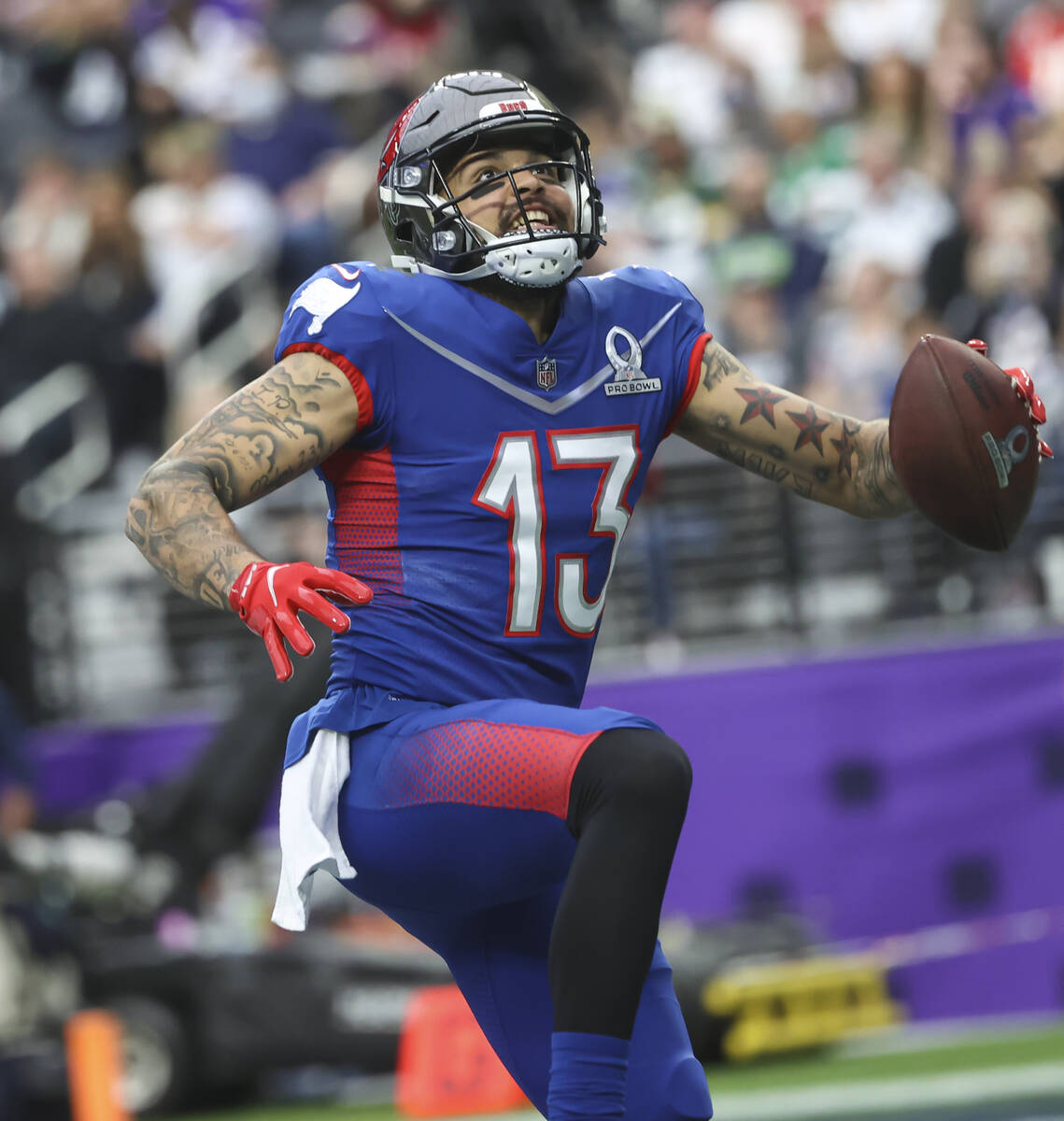 NFC wide receiver Mike Evans of the Tampa Bay Buccaneers (13) celebrates his touchdown during t ...