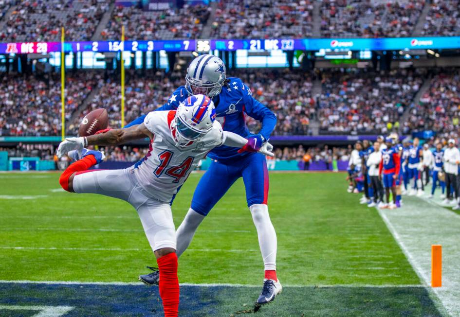 AFC wide receiver Stefon Diggs of the Buffalo Bills (14) has a pass broken up in the end zone b ...