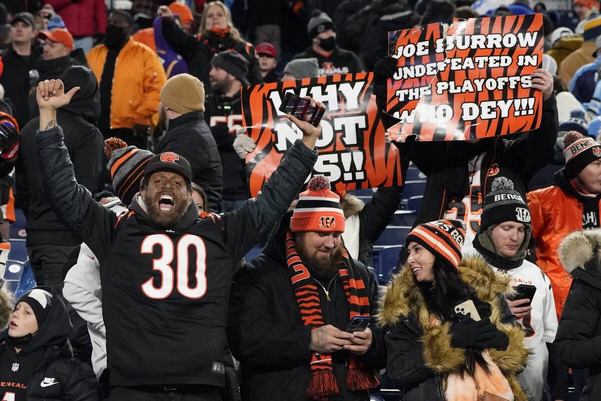 Cincinnati Bengals fans celebrate the 52-yard game-winning field goal of Cincinnati Bengals kic ...