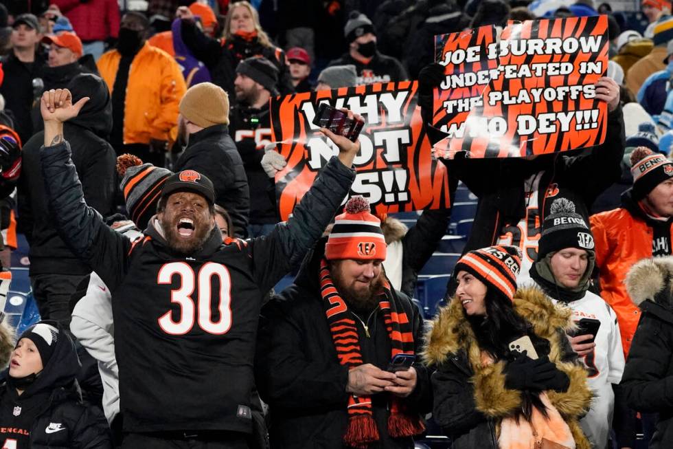 Cincinnati Bengals fans celebrate the 52-yard game-winning field goal of Cincinnati Bengals kic ...