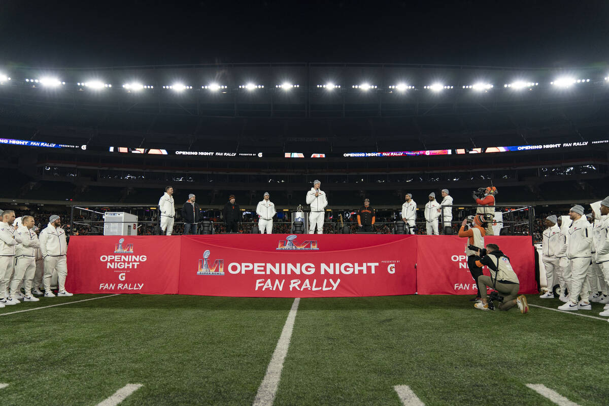 Cincinnati Bengals quarterback Joe Burrow, center, speaks during the Super Bowl LVI Opening Nig ...