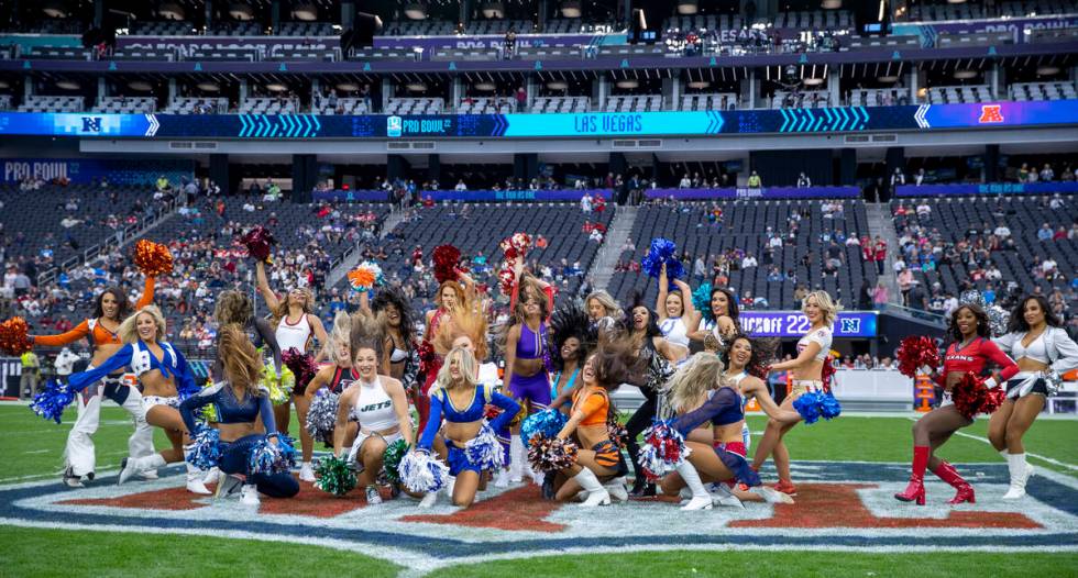 Cheerleaders scramble into position for a group shot during the first half of the Pro Bowl at A ...