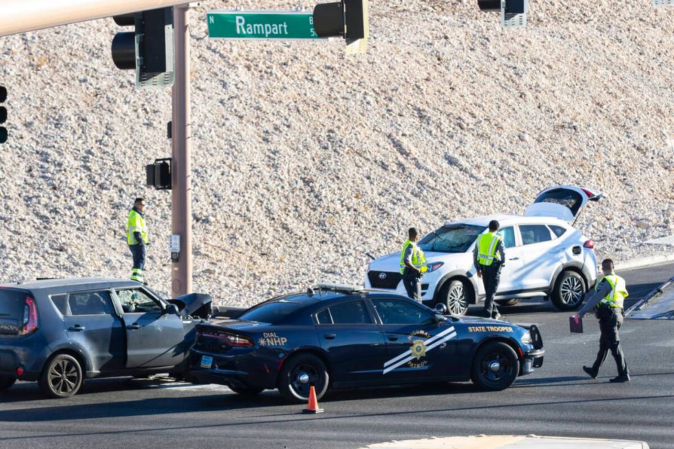 Las Vegas police is investigating after four people, including two children, were injured in a ...