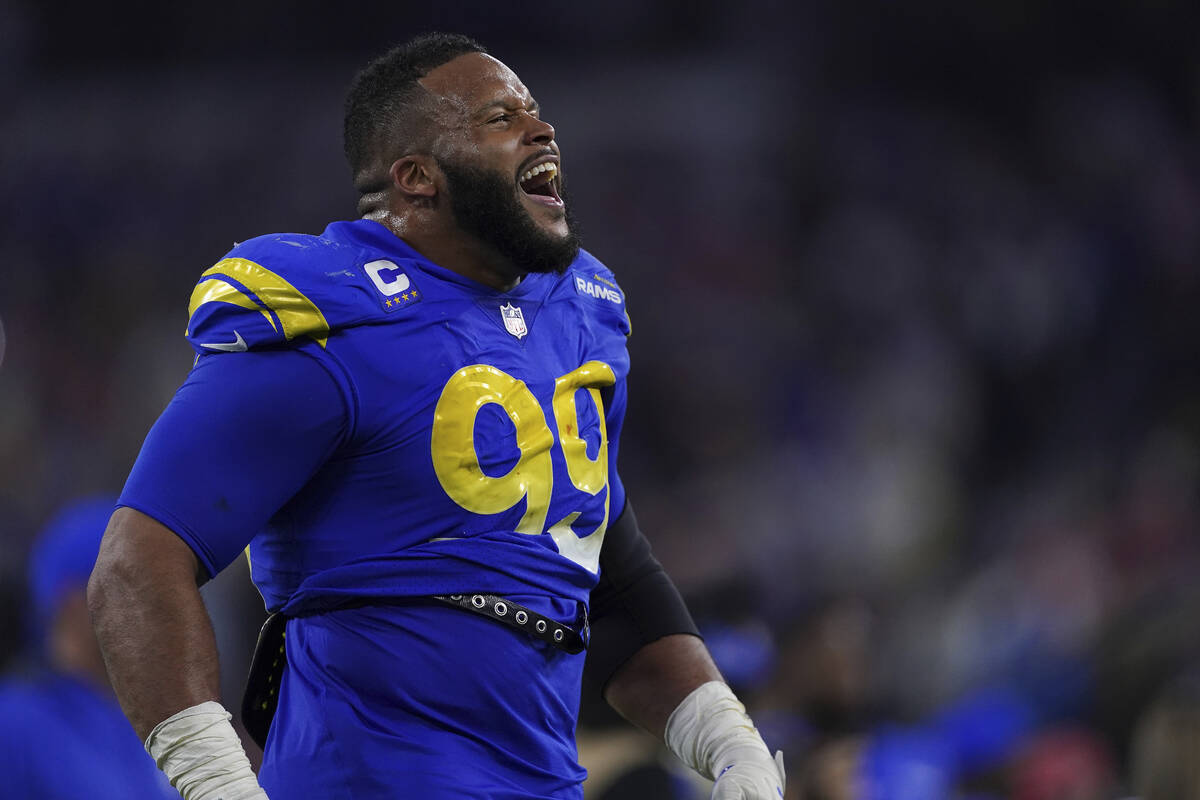 Los Angeles Rams defensive lineman Aaron Donald (99) celebrates his team's victory over the San ...