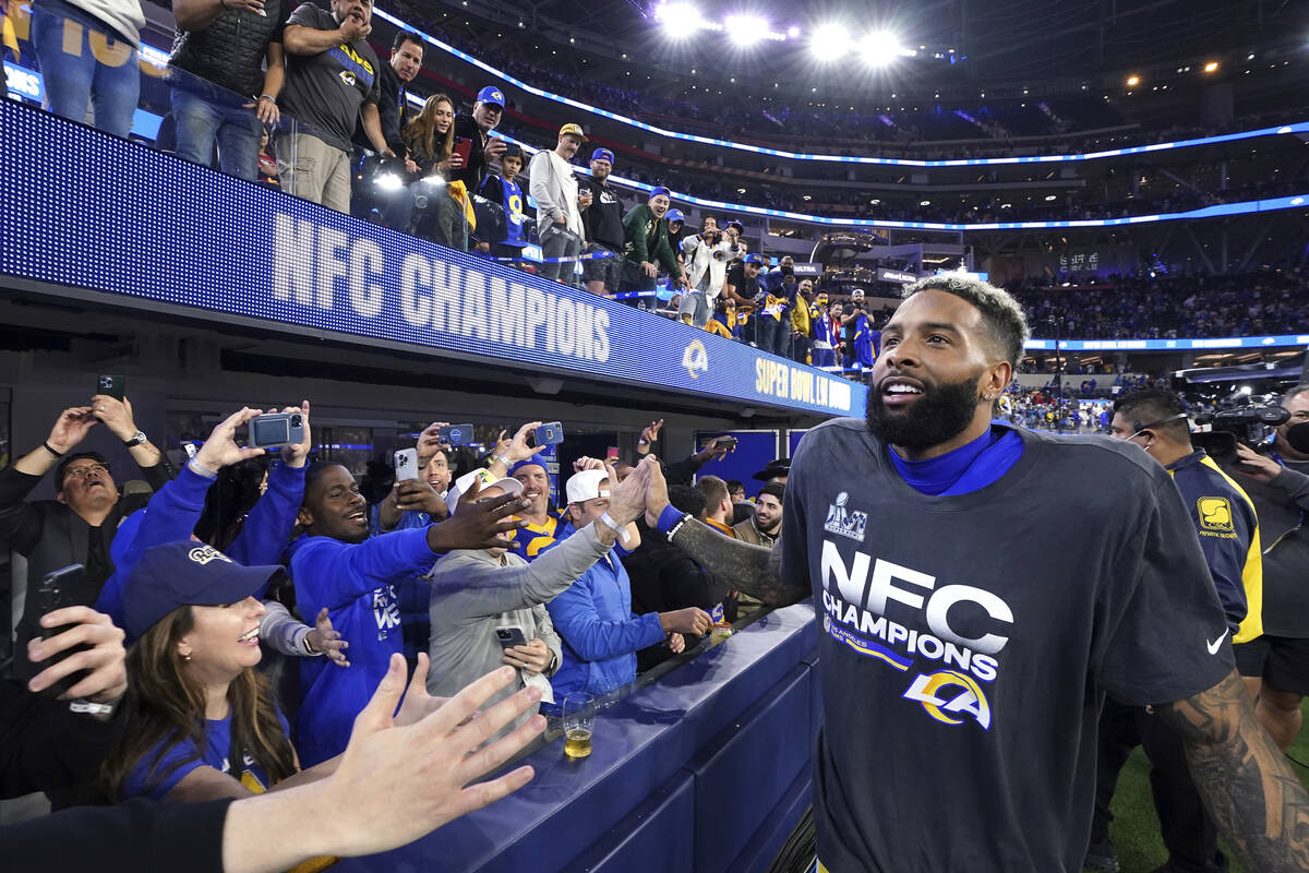 Los Angeles Rams wide receiver Odell Beckham Jr. (3) celebrates with fans after defeating the S ...