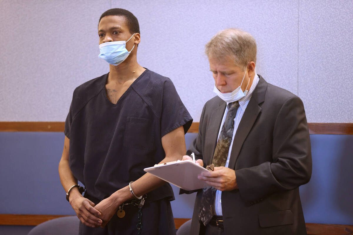 Marcas Crowley, left, appears in court with his attorney Craig Mueller at the Regional Justice ...