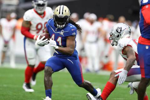 NFC running back Alvin Kamara (41) of the New Orleans Saints rushes during the NFL Pro Bowl foo ...