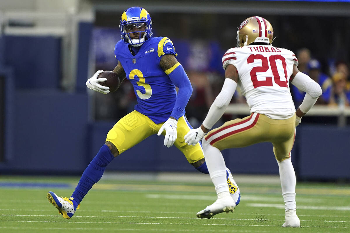 Los Angeles Rams wide receiver Odell Beckham Jr. (3) looks to avoid San Francisco 49ers cornerb ...