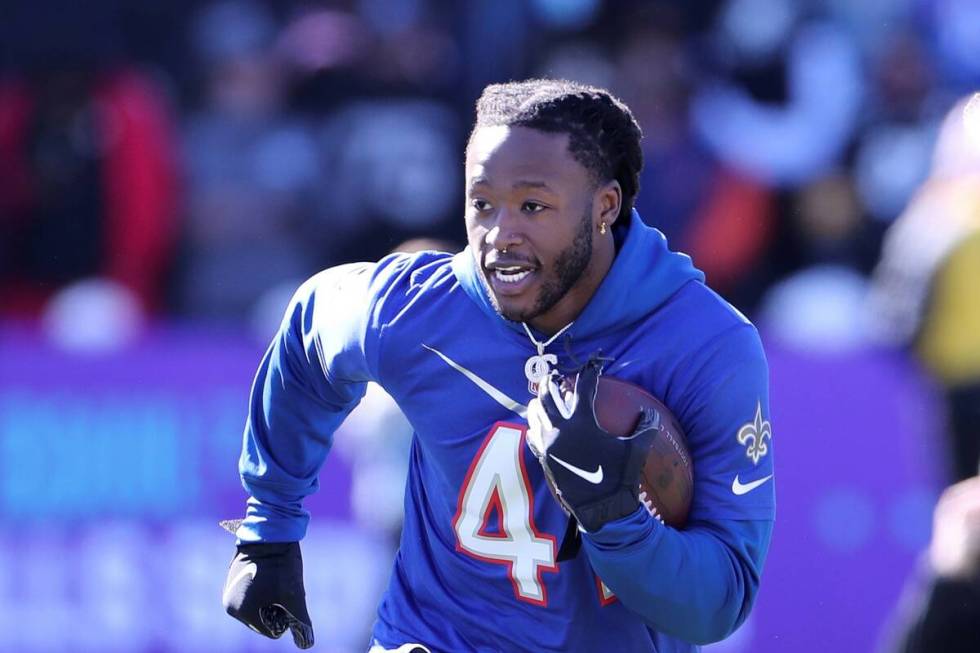 Alvin Kamara of the New Orleans Saints runs with the ball during Pro Bowl NFL football practice ...