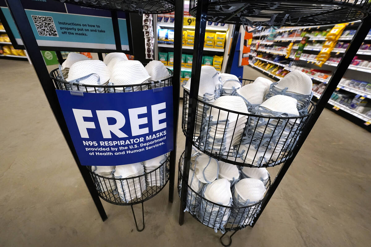 A product stall filled with free N95 respirator masks, provided by the U.S. Department of Healt ...