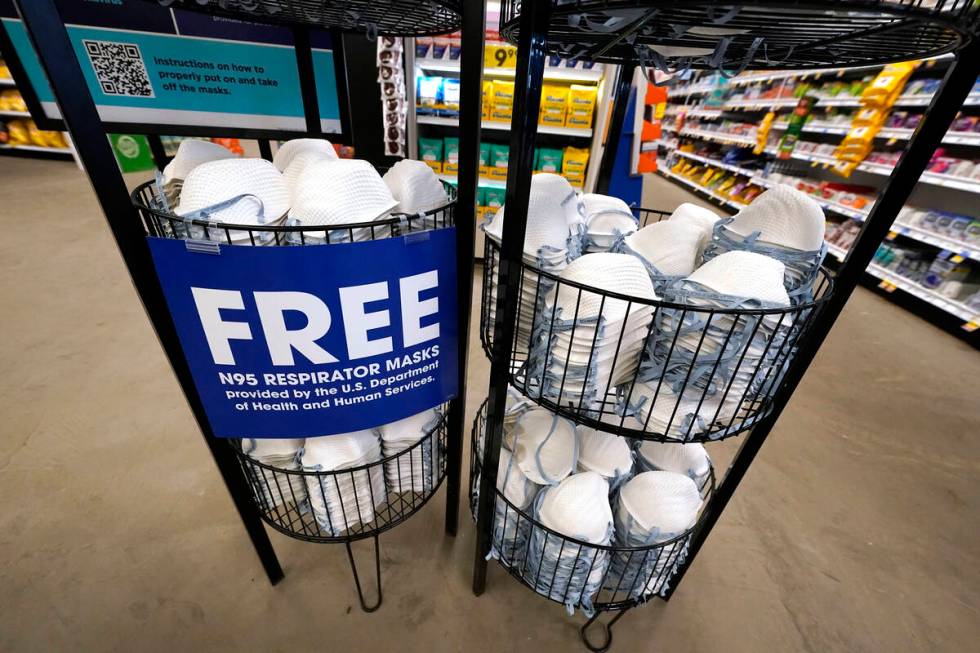 A product stall filled with free N95 respirator masks, provided by the U.S. Department of Healt ...