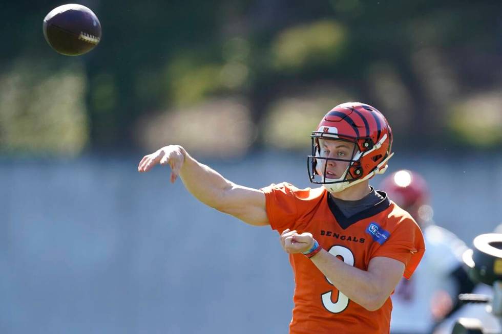 Cincinnati Bengals' Joe Burrow thorws during practice Thursday, Feb. 10, 2022, in Los Angeles. ...