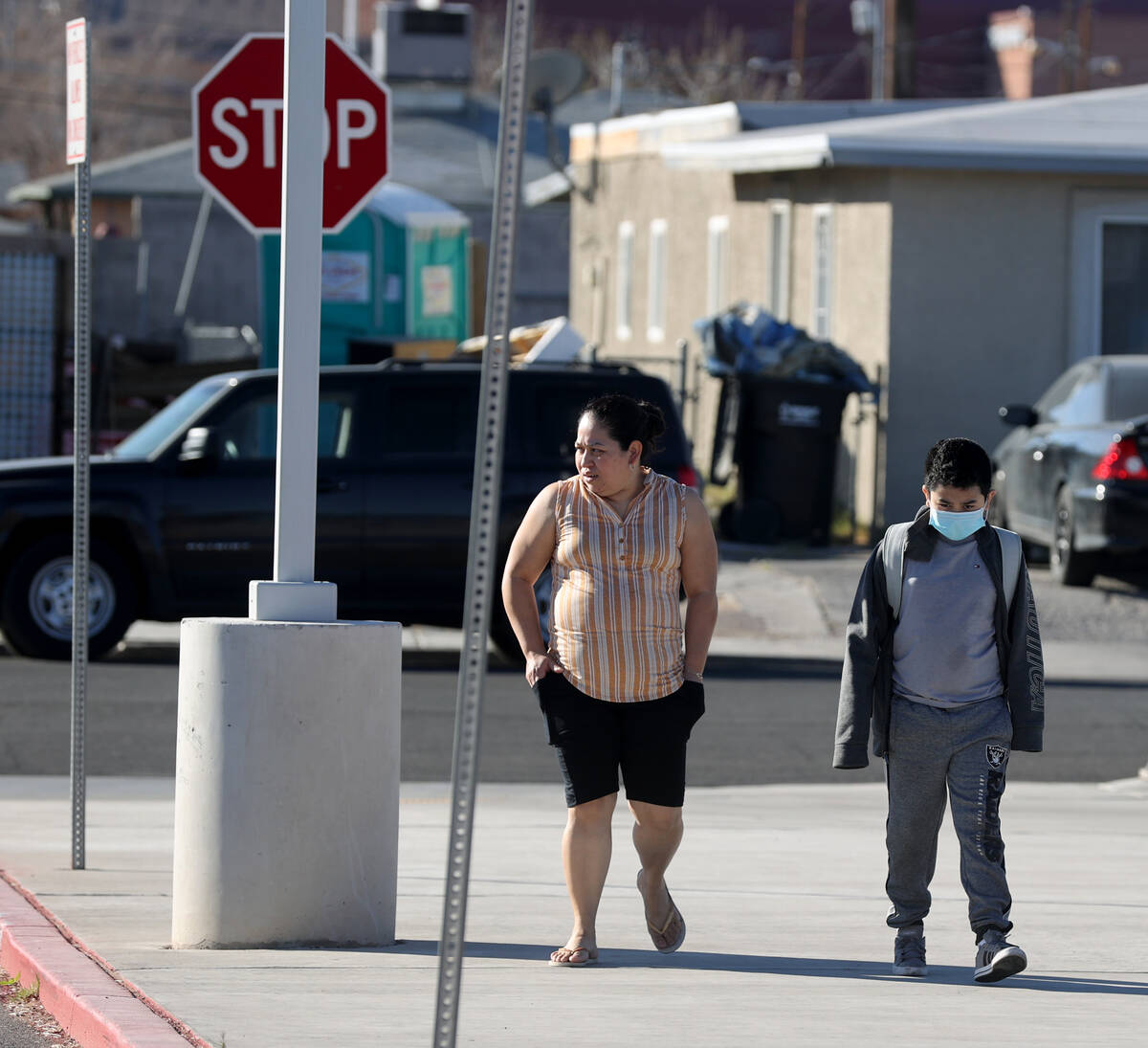 Lubia Hernandez drops off her son Luis Linares, 8, at Wendell Williams Elementary School in Las ...