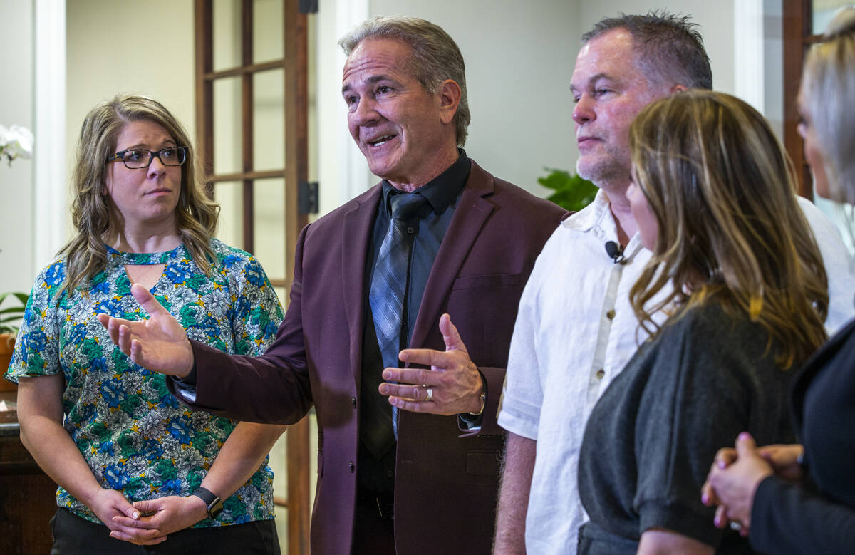 (From left) Attorney Alyssa Piraino looks to Lead Attorney Lloyd Baker speaking beside Martin a ...