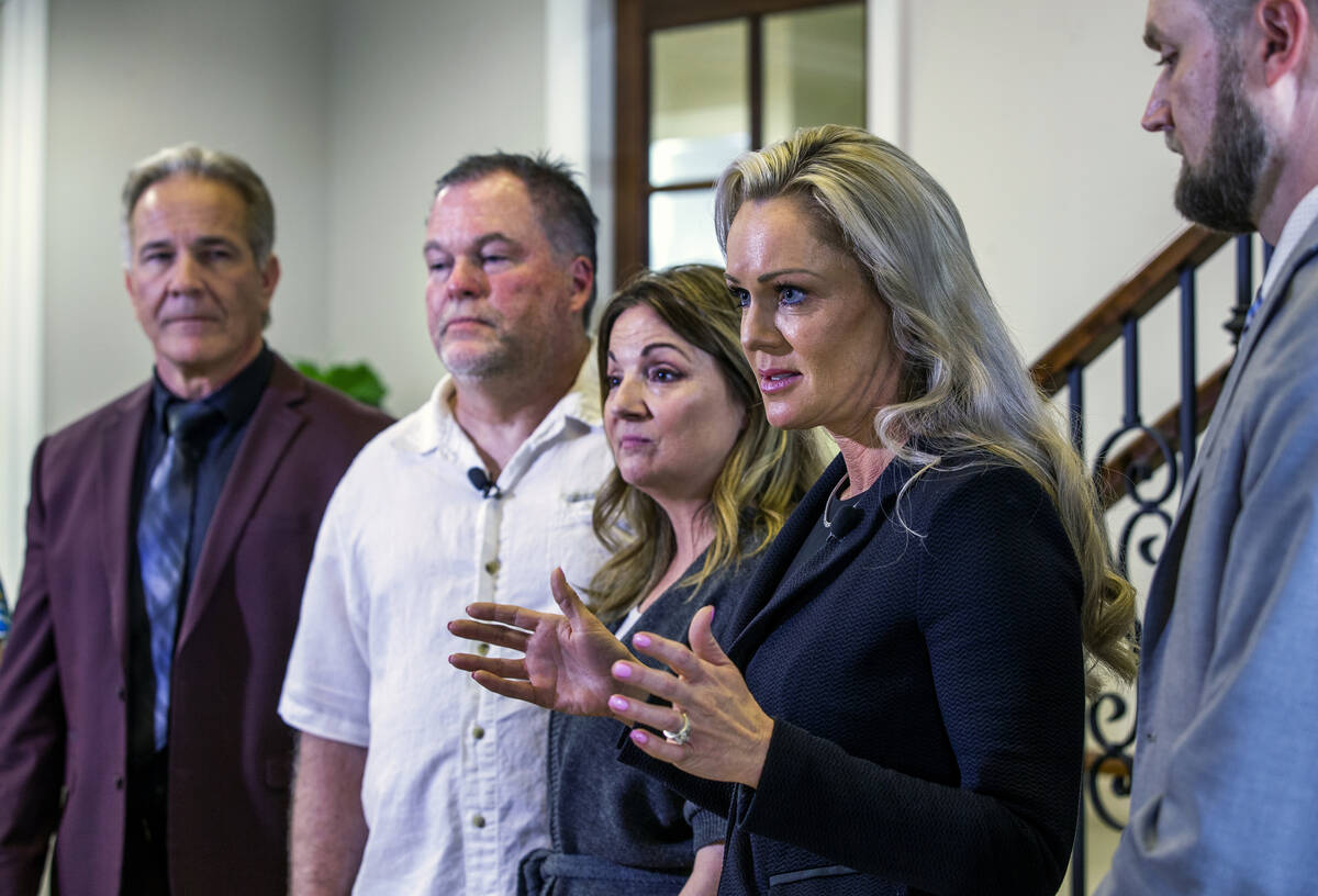 (From left) Lead Attorney Lloyd Baker with Martin and Tammara Slatsky listen as Attorney Christ ...