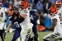 Cincinnati Bengals linebacker Logan Wilson (55) intercepts the ball against the Tennessee Titan ...