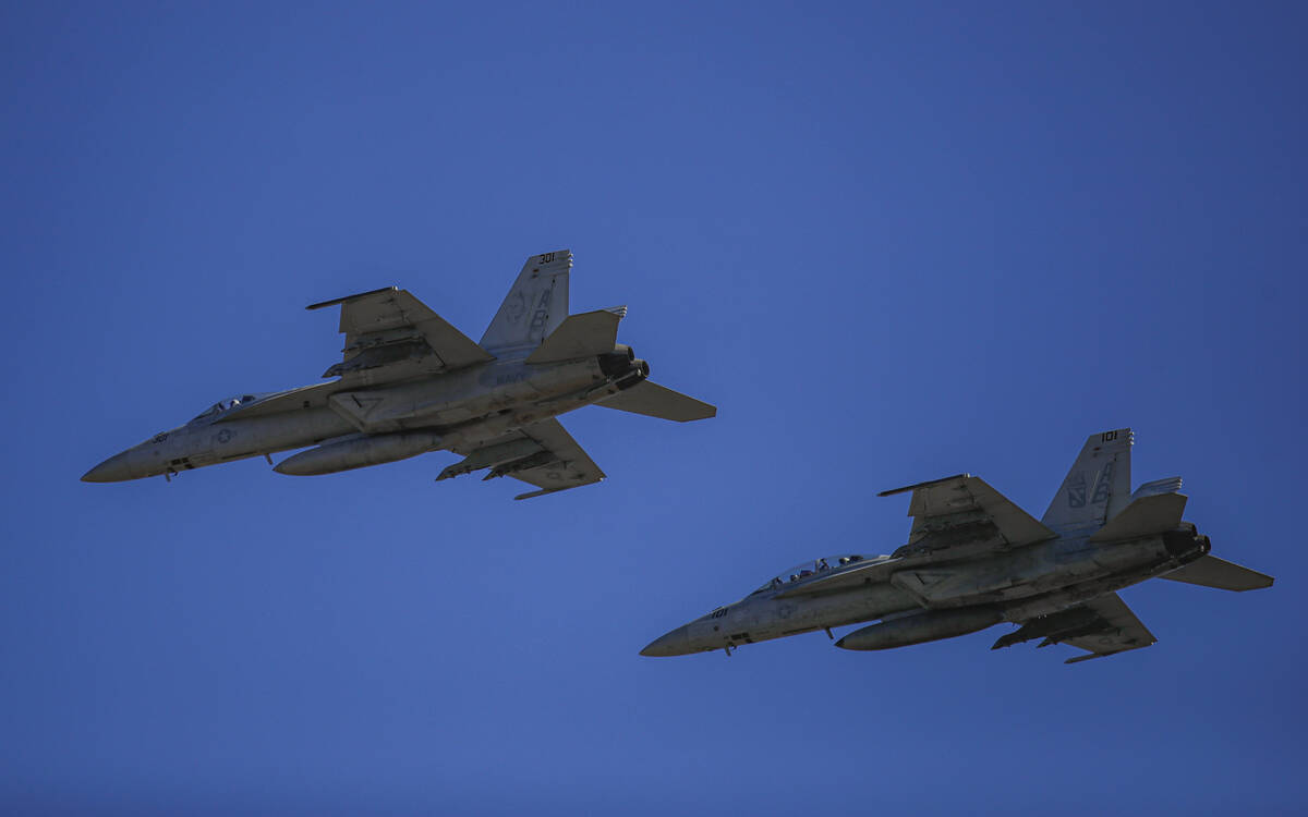 US Navy fighter jets fly during the visit of NATO Secretary General Jens Stoltenberg at the Mih ...