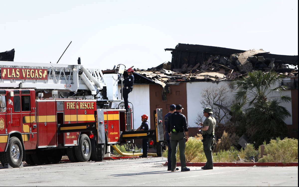 Members of Las Vegas Fire and Rescue work on scene at the Silverstone Golf Club, Saturday, Nov. ...