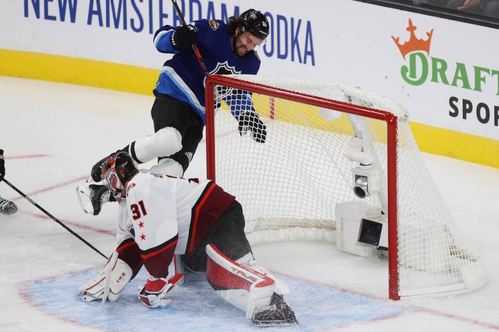 Vegas Golden Knights forward Mark Stone (61) takes a fall while attempting to score against Car ...