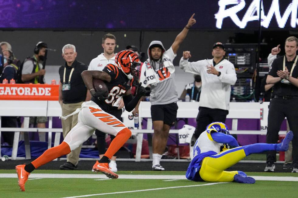 Cincinnati Bengals wide receiver Tee Higgins, left, runs past Los Angeles Rams cornerback Jalen ...