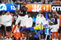 Cincinnati Bengals wide receiver Tee Higgins (85) catches a pass against Los Angeles Rams corne ...