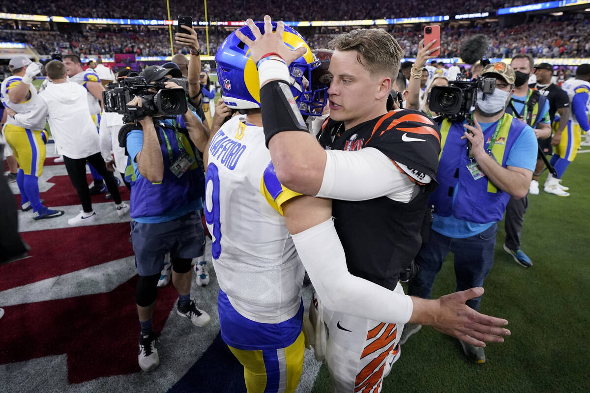 Cincinnati Bengals quarterback Joe Burrow, right, congratulates Los Angeles Rams quarterback Ma ...