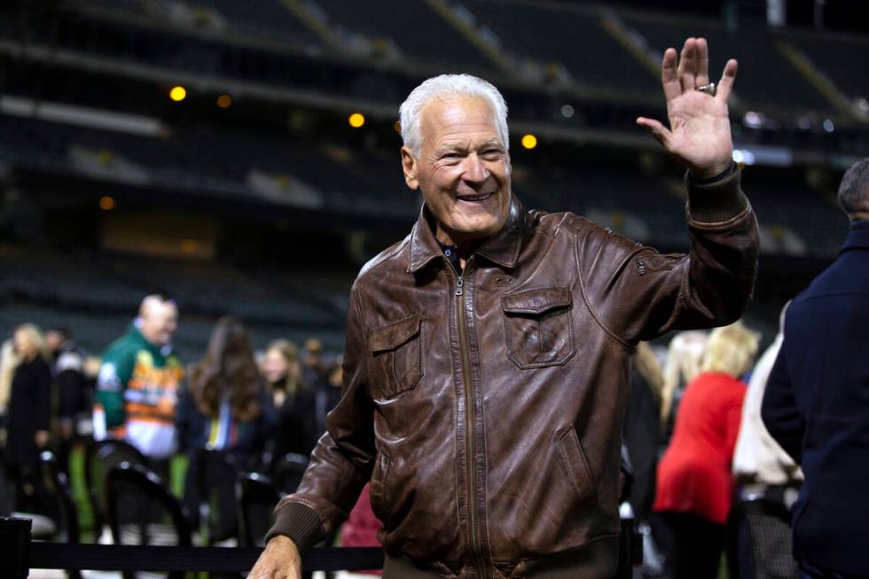 Former Oakland Raiders linebacker Phil Villapiano waves to the crowd following a memorial servi ...
