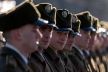 Honor guard soldiers attend a ceremony to mark the anniversary of the withdrawal of Soviet troo ...