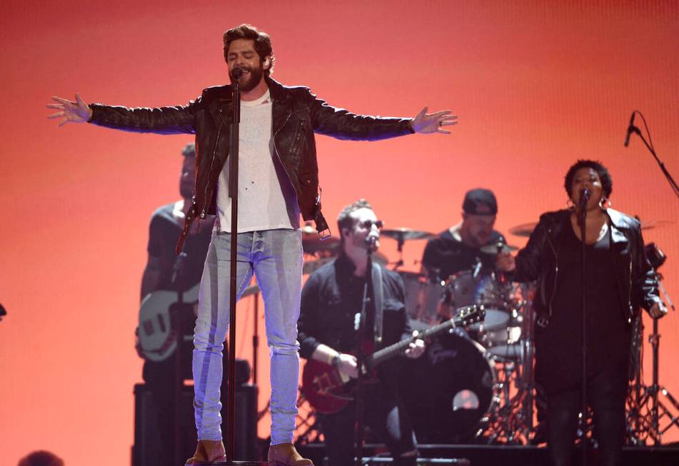 Thomas Rhett performs "Look What God Gave Her" at the 54th annual Academy of Country ...
