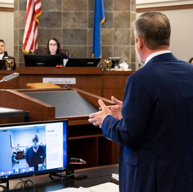 Gary Walker, left, appears in court via videoconference during his sentencing for voluntary man ...