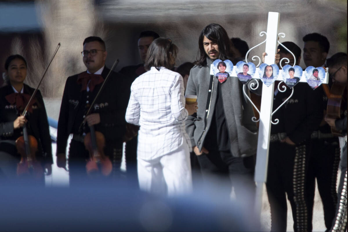 Attendees of the memorial service for the Zacarias family, 7 of whom were killed in a North Las ...