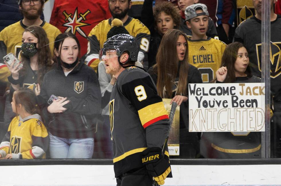 Fans of Golden Knights center Jack Eichel (9) watch him warm up before the start of an NHL hock ...