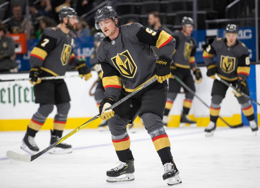 Golden Knights center Jack Eichel (9) warms up before the start of an NHL hockey game against t ...