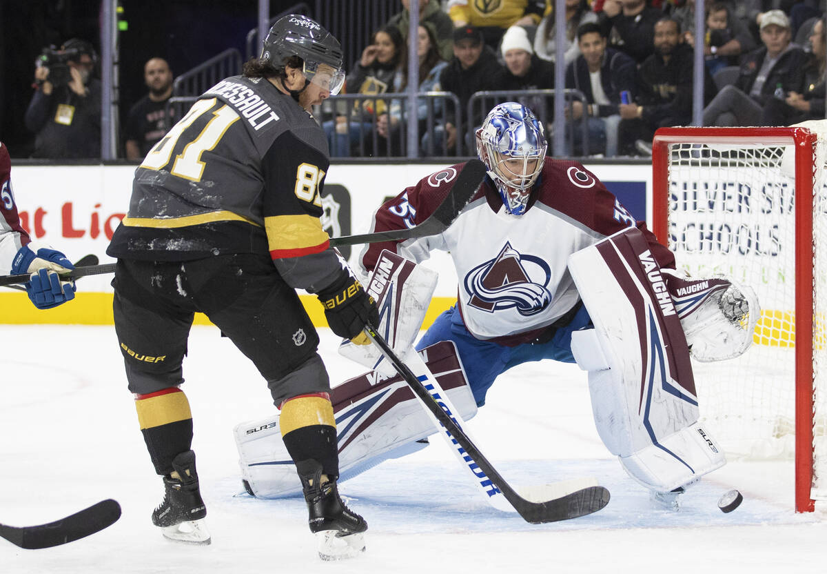 Golden Knights center Jonathan Marchessault (81) shoots on Colorado Avalanche goaltender Darcy ...