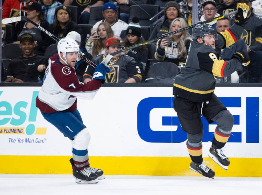 Golden Knights center Jack Eichel (9) sprints up ice past Colorado Avalanche defenseman Devon T ...