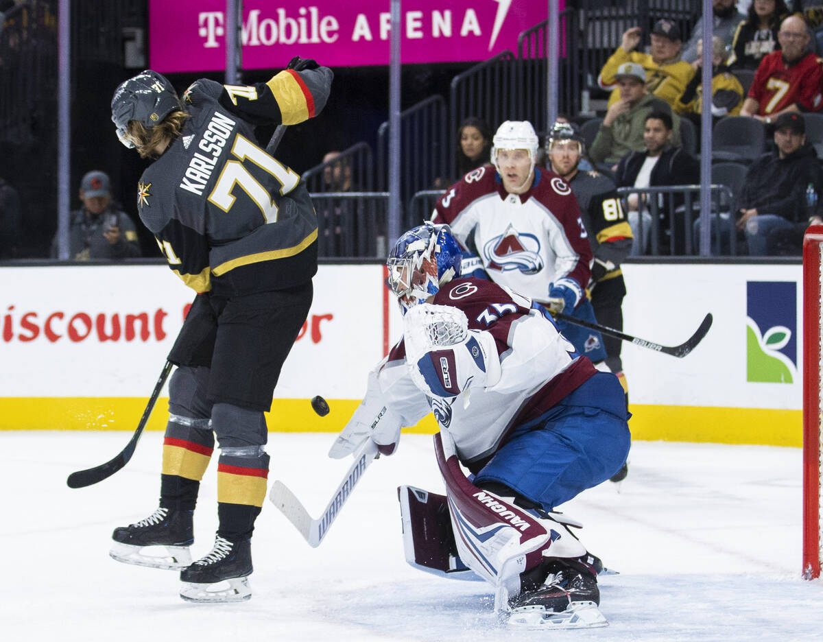 Golden Knights center William Karlsson (71) tries to redirect a shot past Colorado Avalanche go ...