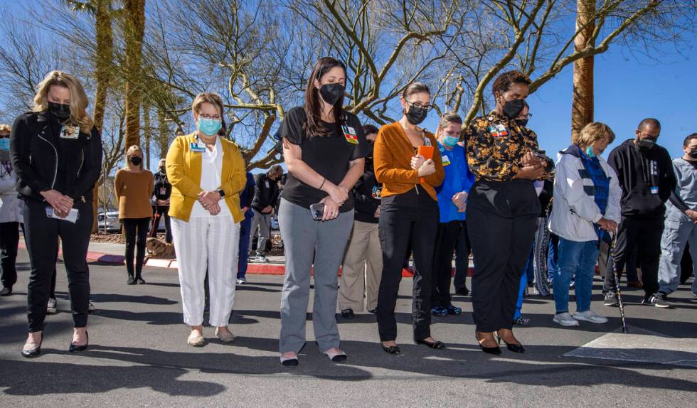 Attendees pray together during a nondenominational citywide prayer event at Southern Hills Hosp ...