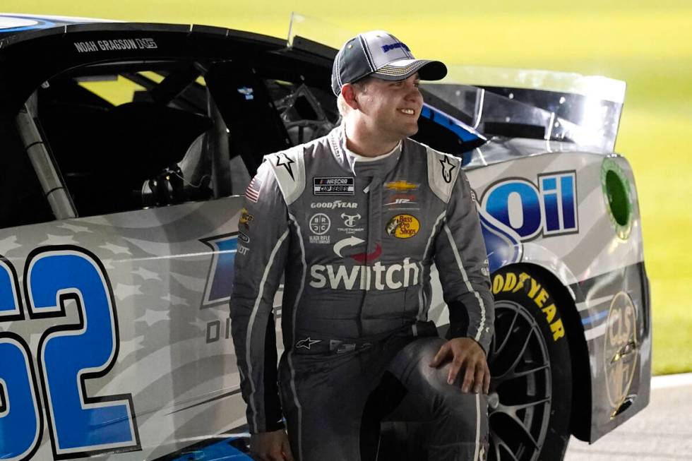 Noah Gragson smiles after his run during qualifying for the NASCAR Daytona 500 auto race at Day ...