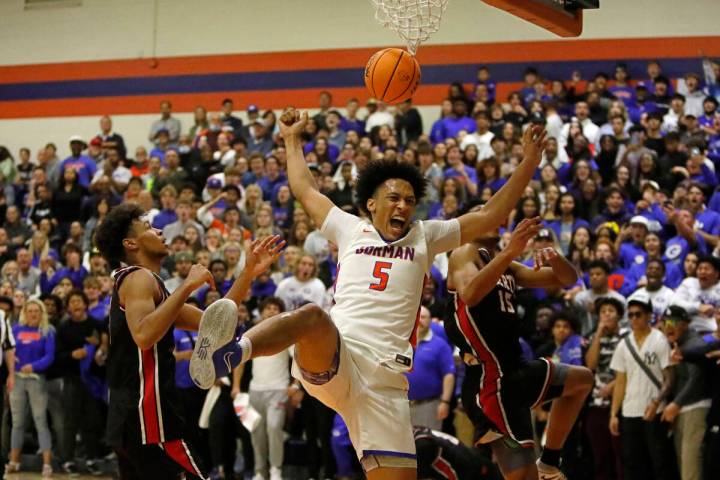 Bishop Gorman High School's Darrion Williams (5) shows emotion after he scores against Liberty ...